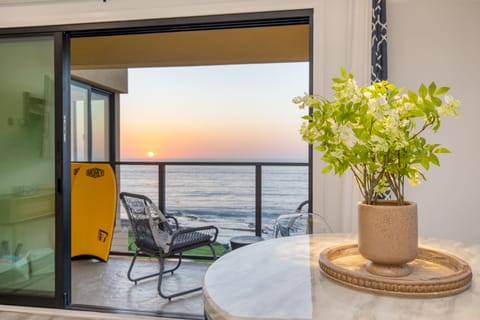 Enjoy sunset meals from indoors or outside.