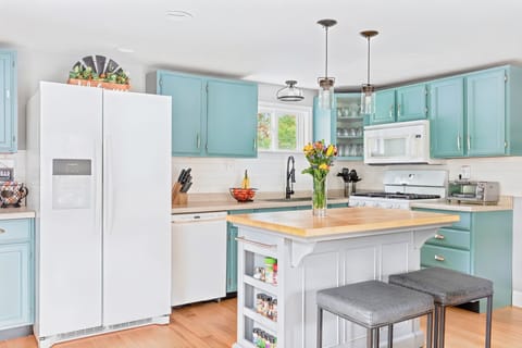 Large variety of spices, olive oil, Pam spray, basic baking needs to entertain. 