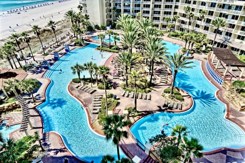 Amazing view of the lagoon pool (for guests to use) and the beach from the condo