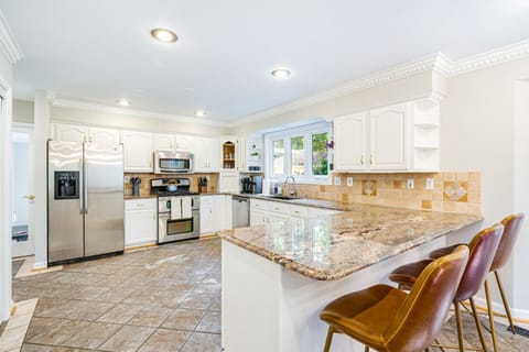 Belly up in the leather barstools for a casual breakfast or laughs while dinner is prepared