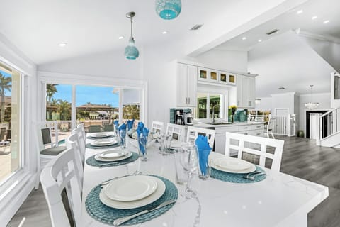  Kitchen Island surrounded by Glass on 3 Sides w/ 180 Degree Water Views