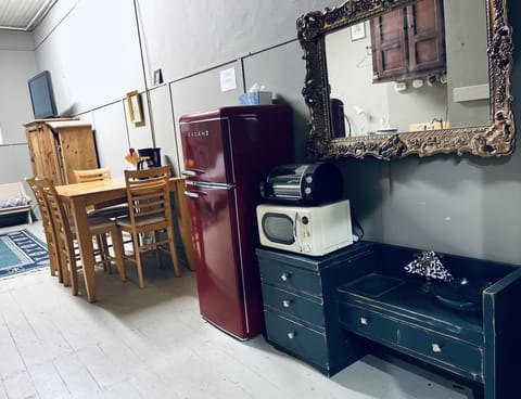 Smaller fridge, toaster oven, microwave; just the basics