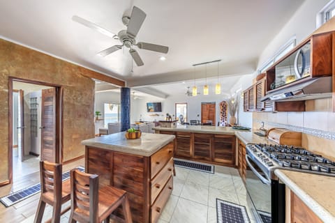 open concept kitchen has everything you need to make a gourmet meal