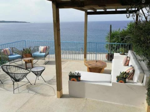 comfortable couch and plenty of seating with the amazing ocean view