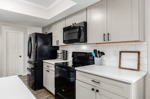 Kitchen with all needed supplies, plus Keurig coffee maker with coffee pods 