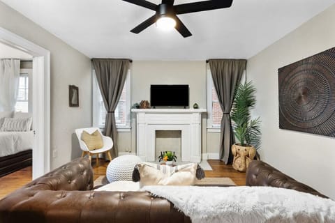 Picture-perfect view of the living room with Smart TV connected to Netflix and Youtube. Love the beautiful wall decor that enhances the total feel of the space.