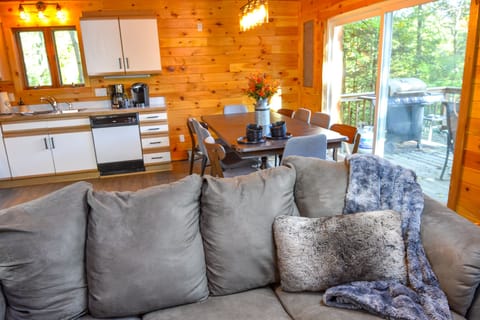 10-person dining table with more overflow tables on the deck. 