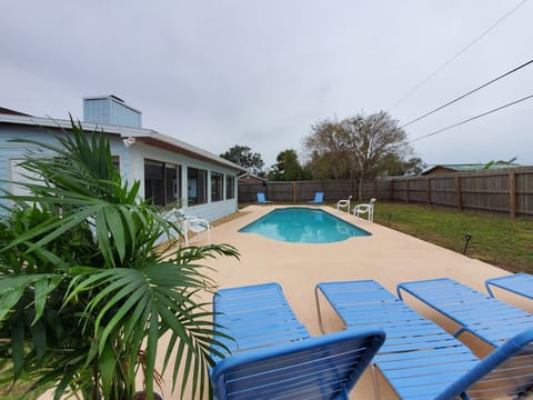 Pool area fenced in back yard for privacy & your pets