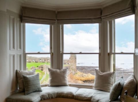 Primary suite bay window seating area. Check out the views.