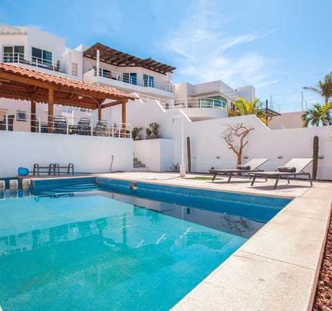Lounge by the poolside and soak up the sun in a peaceful setting