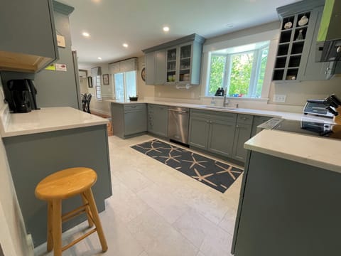 Newly-updated, fully stocked kitchen offers everything you need to dine in!