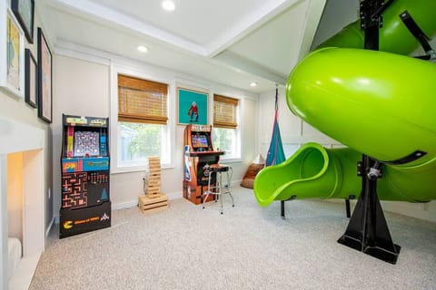 The Green Monster spits you out into this awesome game room