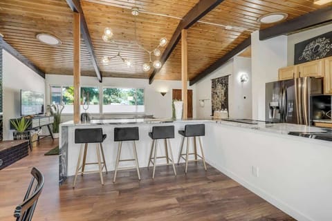 Our Spacious Kitchen Boasts a Thoughtful Design, Perfectly Adjacent to the Living Room. Enjoy the Amazing Views as You Cook and Socialize.