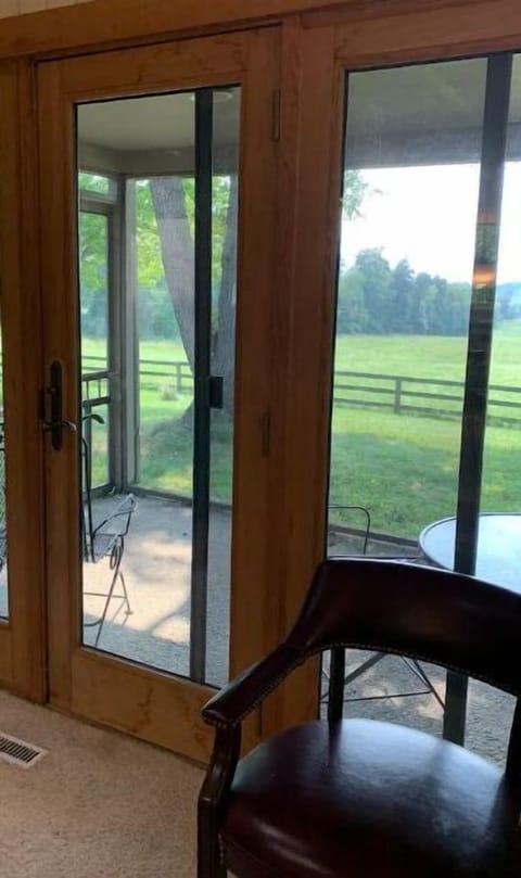 Family room has a screened in porch with table and 4 chairs. Canopy tent smokers
