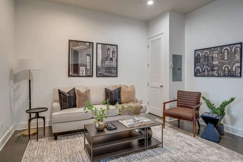 Open concept living room complete with designer furnishings and smart TV.