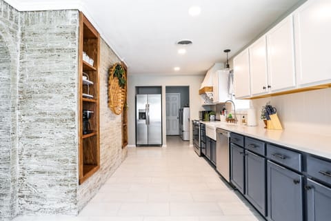 Large kitchen with new stainless appliances