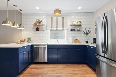 Full kitchen, stove, microwave, dishwasher, pots/pans, dinnerware, utensils.