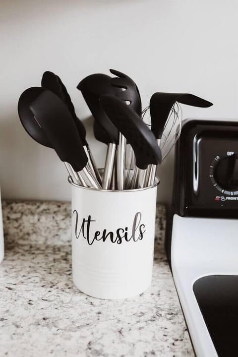 Well stocked kitchen (dish ware, utensils, pots, pans, cooking utensils, and more)