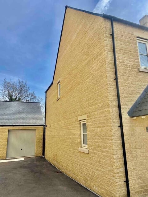 Private drive alongside the house for 2/3 cars. Locked garage can also used for bikes/buggy etc.