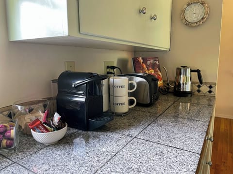 Start your day with a cup of coffee or tea. Nespresso coffee maker, Bodum kettle