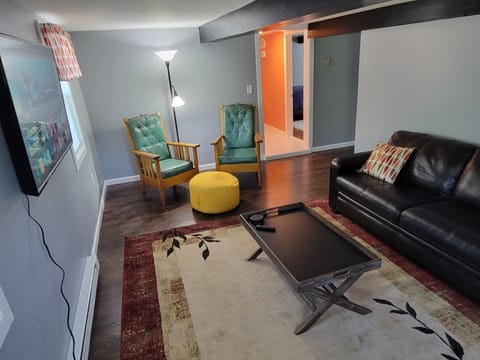 Living room with couch and 2 chairs