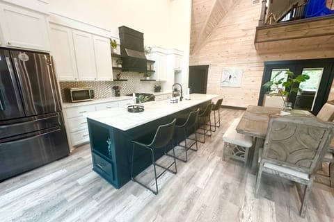 Spacious modern kitchen with large island and seating for everyone.