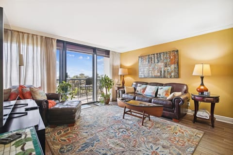 Quality Time - The open, airy great room is large enough to accommodate the whole family, and company too. The leather sectional is an especially comfortable spot for stretching out and watching TV… or treating yourself to a nap.