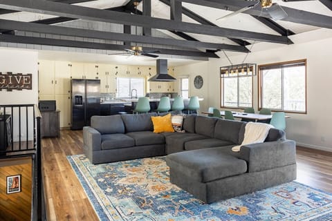 Large open concept living space with Kitchen, Living and Dining all connected perfect for multifamily hangout.