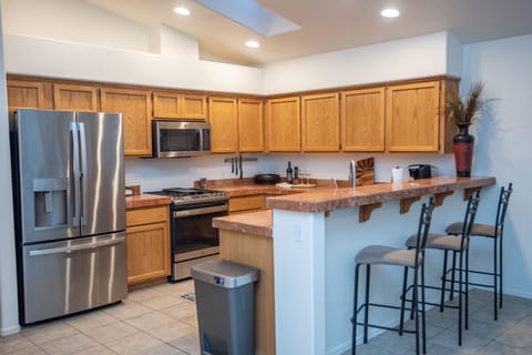 Cozy kitchen with additional seating in front room with a view