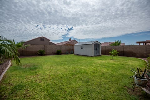 Large back yard with community pool
