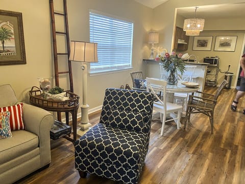 Living room area connected to dining area