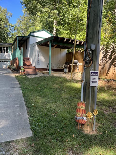 View of entry to tiny house 
from guest parking area.