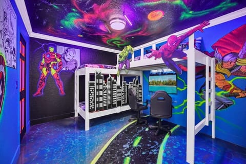 Our Marvel room features glow in the dark murals and floors with Thor, Iron Man, Captain America and Wolverine! Three bunk beds and an arcade machine w/ over 1000 games!