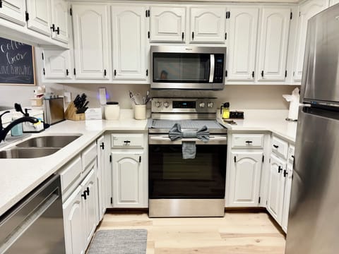 Full kitchen w/blender, hot water maker, slow cooker, ice maker and air fryer.