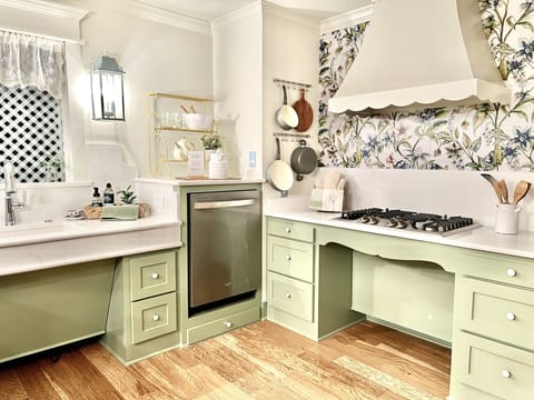 wheel-under kitchen sink & stove, elevated dishwasher and remote control vent