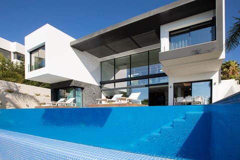 Spectacular pool with glass wall