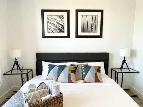 King-sized bed with a comfortable memory foam mattress