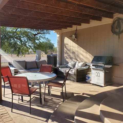 Patio off kitchen makes it easy for enjoying the outdoors or grilling.