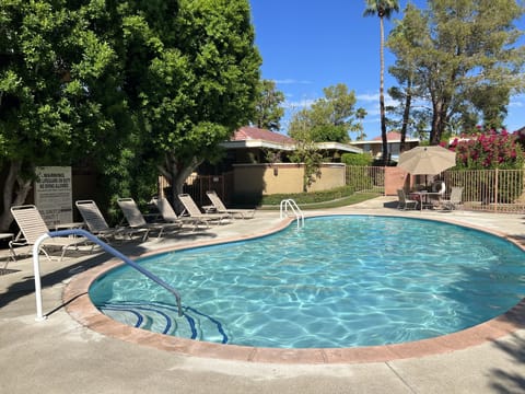 Unit in background, adjacent to pool