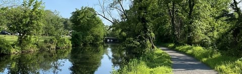Unwind with a peaceful stroll along the scenic river path.
