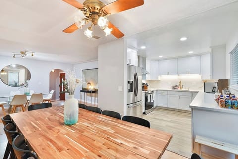 Enjoy your lunch or dinner here at our dining table. More sitting for others too!