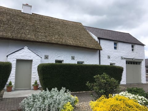 Connell's Barn is adjacent to Connell's House (thatched roof) 2 separate homes.