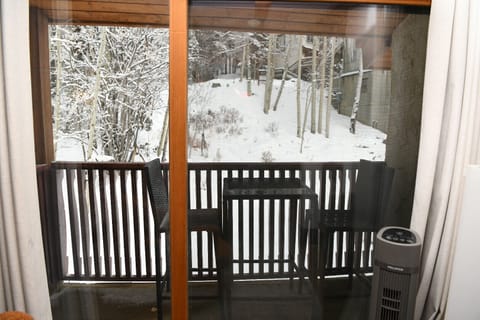 Porch just beyond the bed