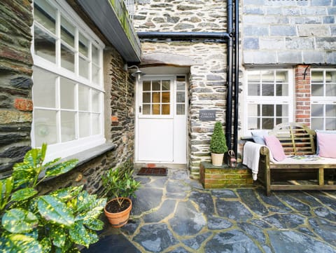 Seating in the courtyard outside the property