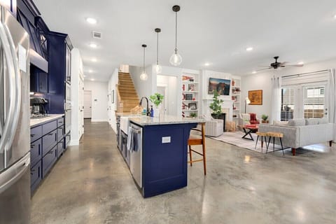 Directly to the left of the living room, you'll enter our kitchen.