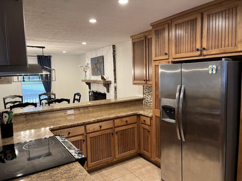 Fully stocked with - microwave, blender, toaster, pots, pans, dishes & utensils