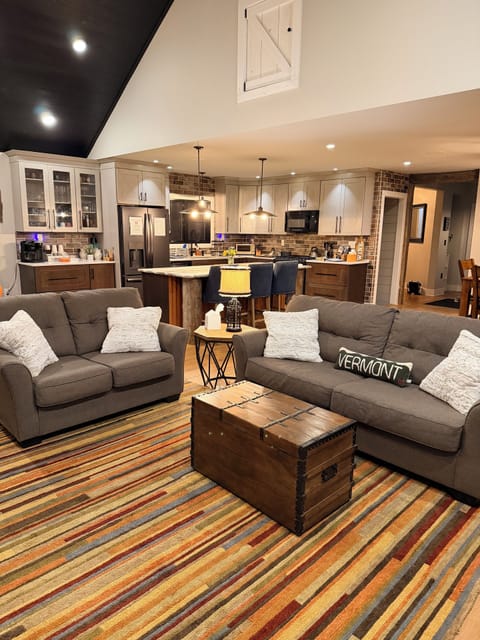 Open floor plan - living room, kitchen & dining area