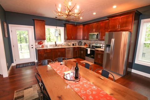 Brand new appliances. Fully stocked kitchen. Sitting for up to 12 guests.