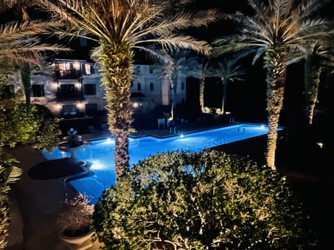 View from balcony at night with waterfall sound