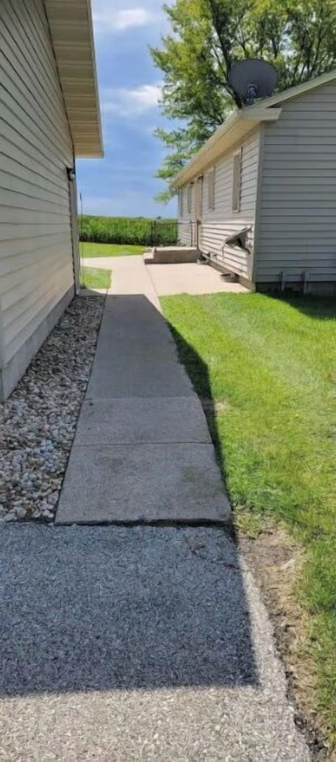 The sidewalk that leads from your parking to your home away from home.